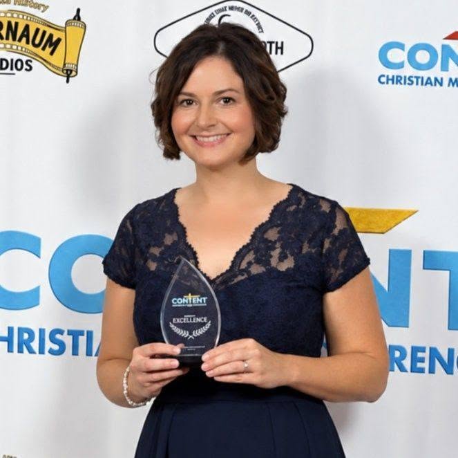 Courtney Lee Simpson accepting Best Director at the CONTENT Christian Conference
